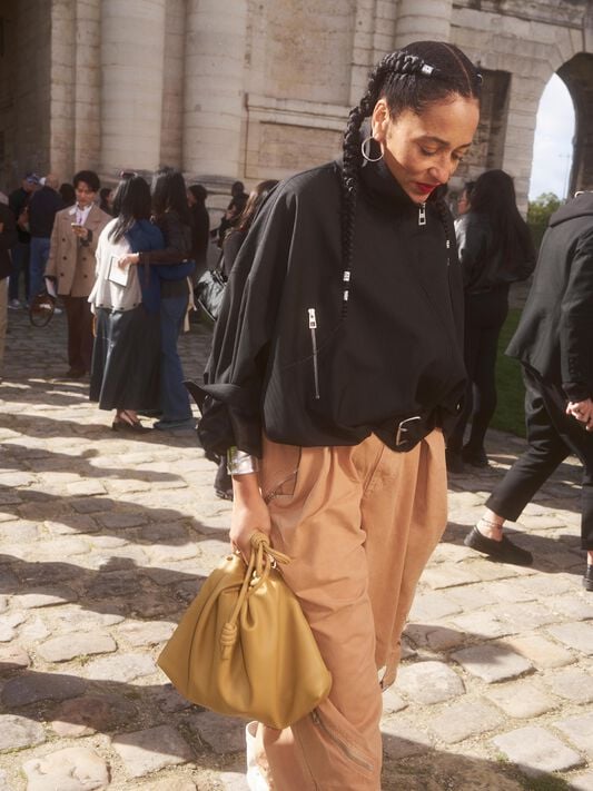ss25 runway women show guests on podium