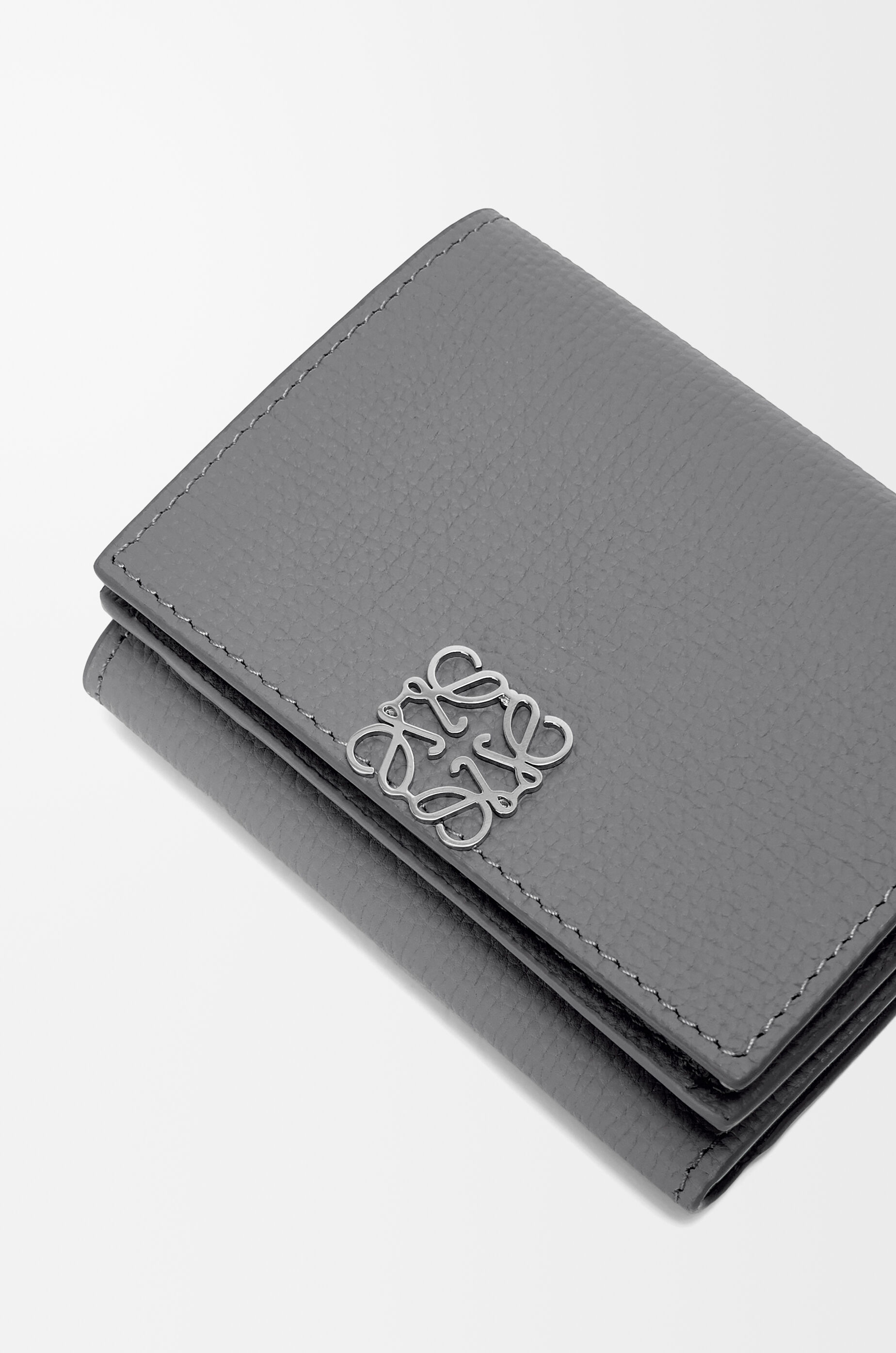 Anagram trifold wallet in pebble grain calfskin Asphalt Grey LOEWE