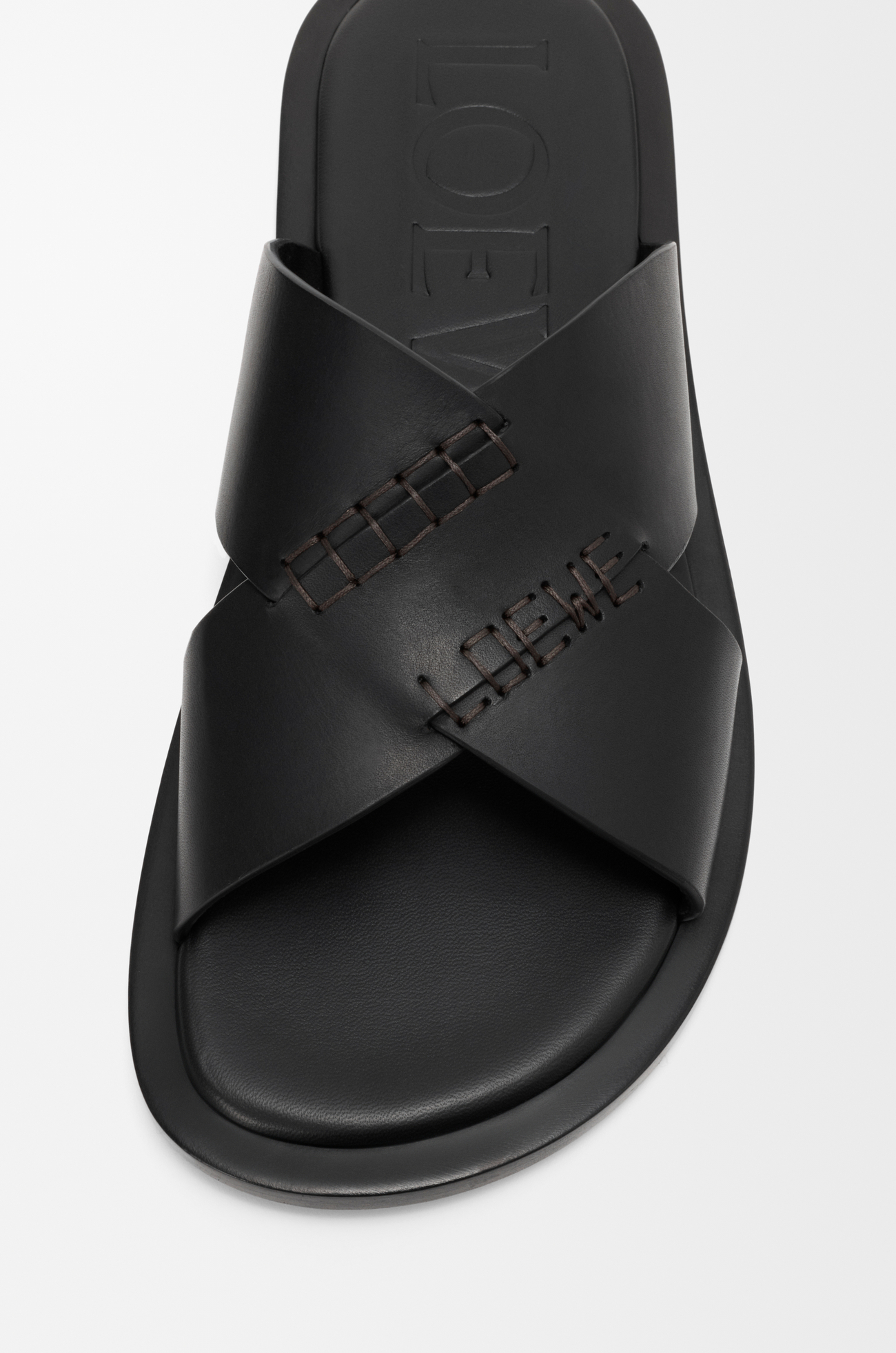 LOEWE Flex criss-cross slide in vegetable-tanned calfskin Black
