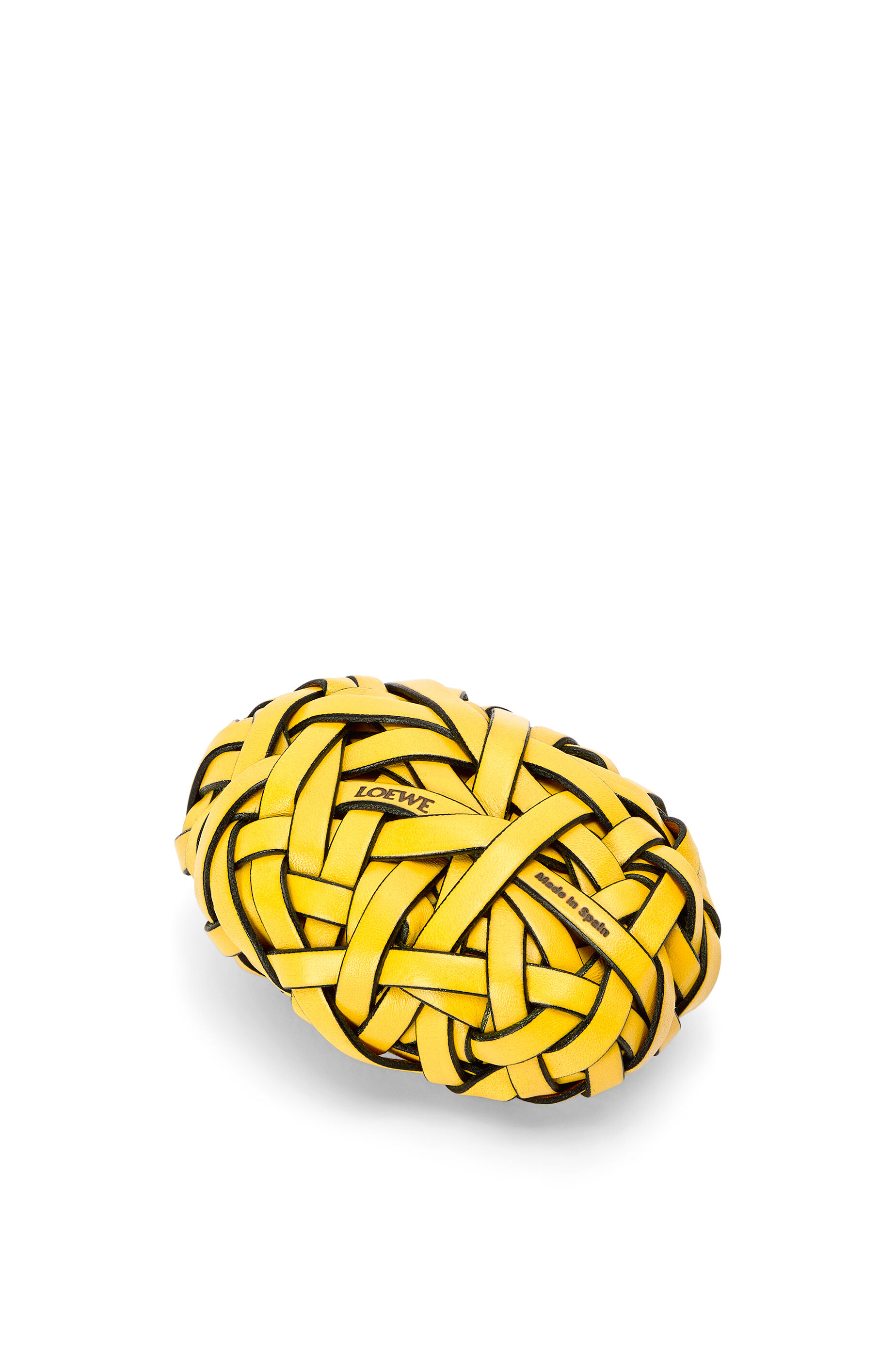 Nest woven paperweight in stone and calfskin