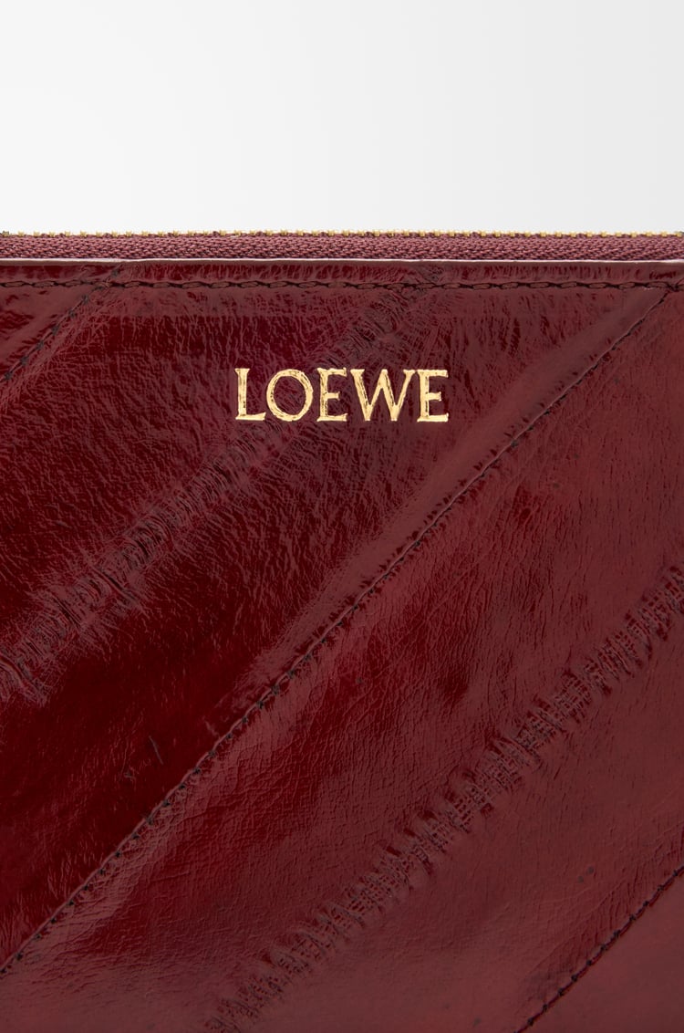 LOEWE 노트 슬림 집 어라운드 지갑 - 일 다크 버건디