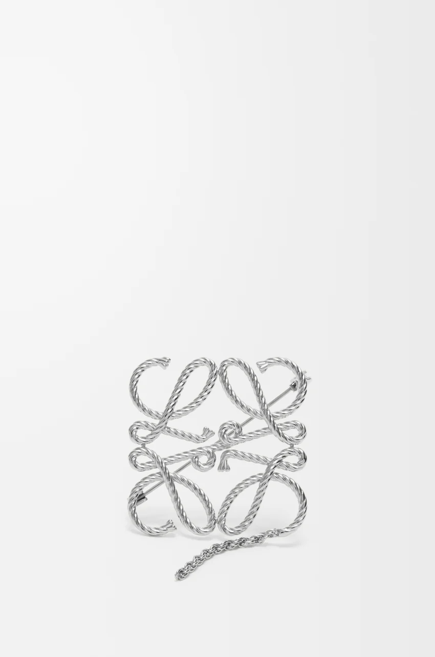 Anagram brooch
