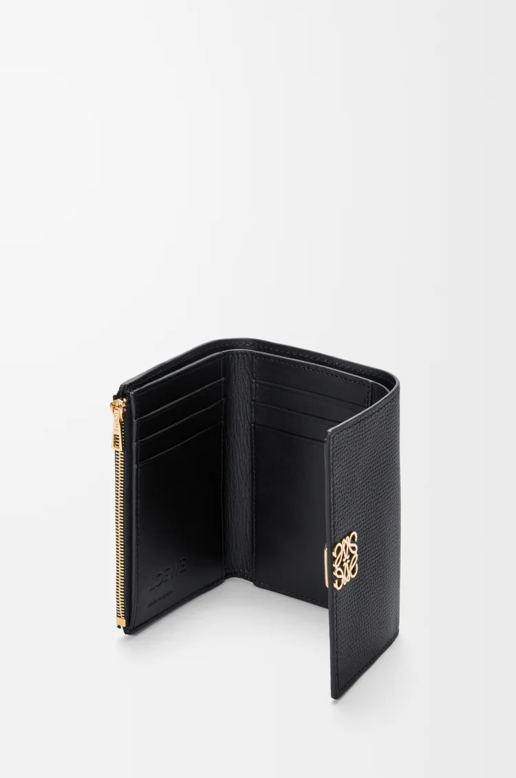 LOEWE Petit portefeuille vertical Anagram en cuir de veau grainé Noir/Doré