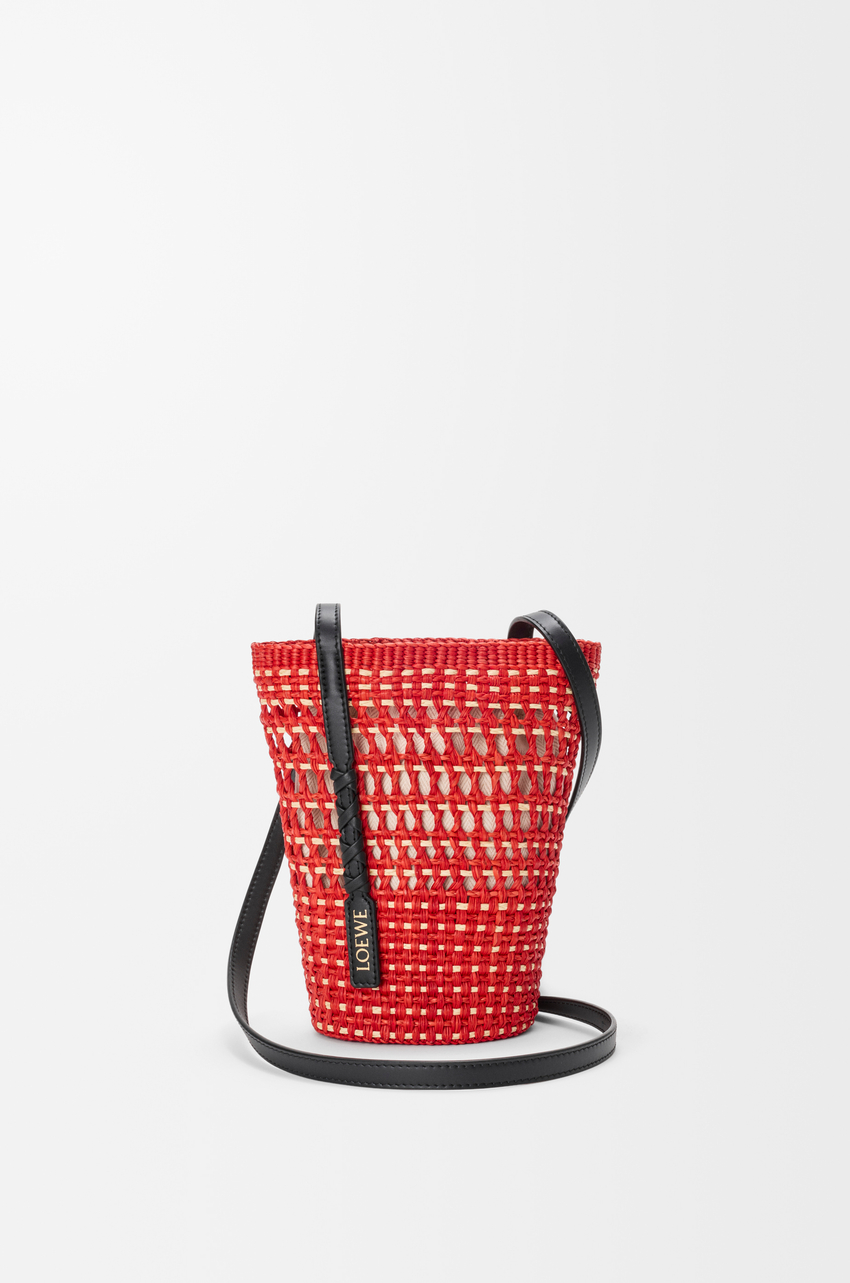 Braid pocket in iraca palm and calfskin