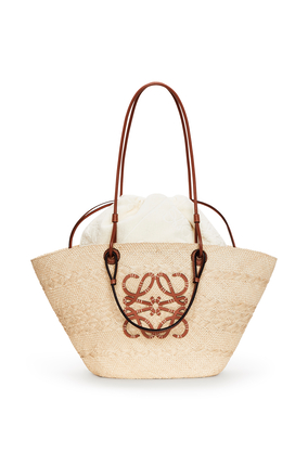 LOEWE Anagram Basket bag in iraca palm and calfskin & Drawstring pouch in cotton towelling 