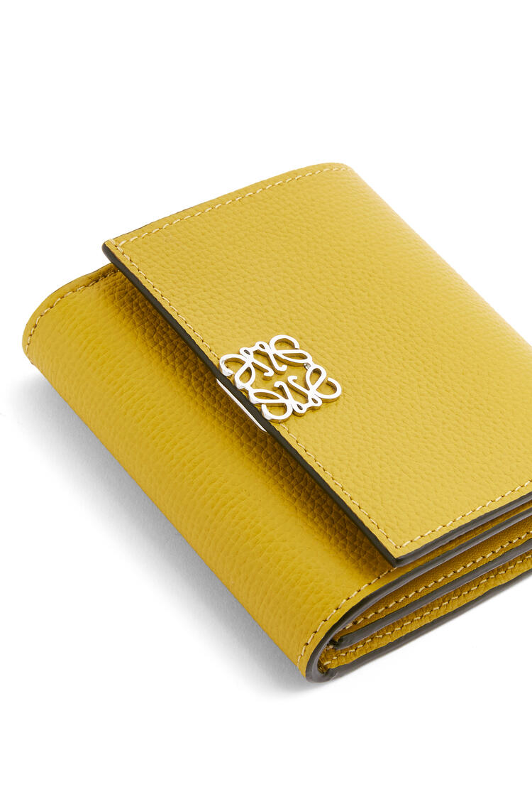 LOEWE Anagram compact flap wallet in pebble grain calfskin Ochre