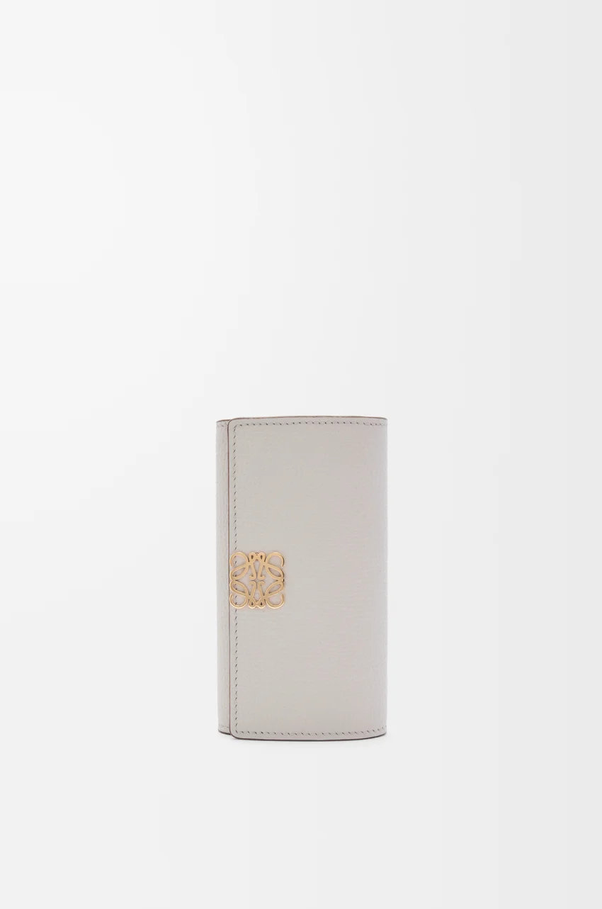 Anagram key case in pebble grained calfskin