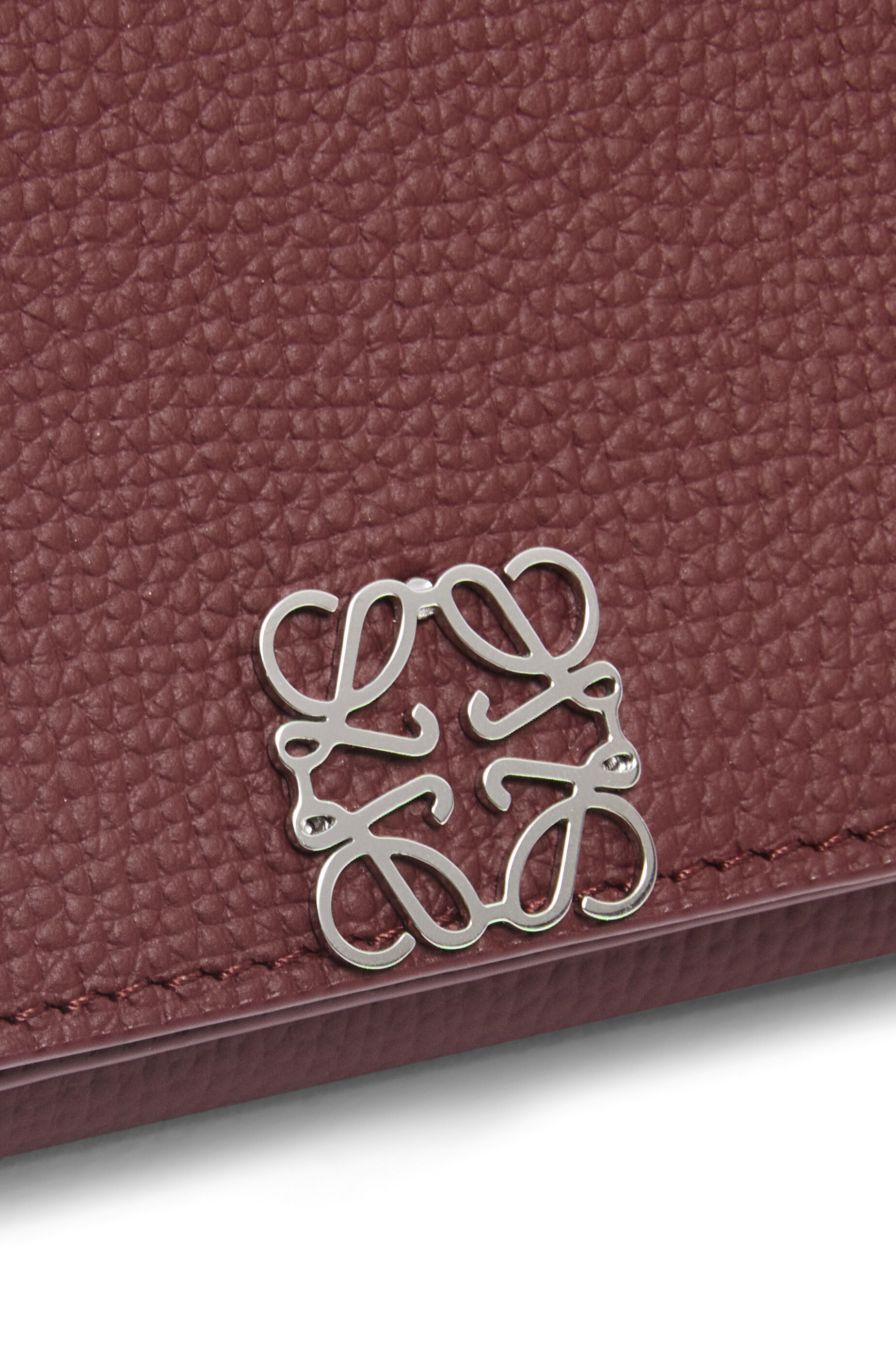 Anagram trifold wallet in pebble grain calfskin Burgundy LOEWE