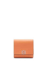 LOEWE Anagram compact flap wallet in pebble grain calfskin Coral Reef