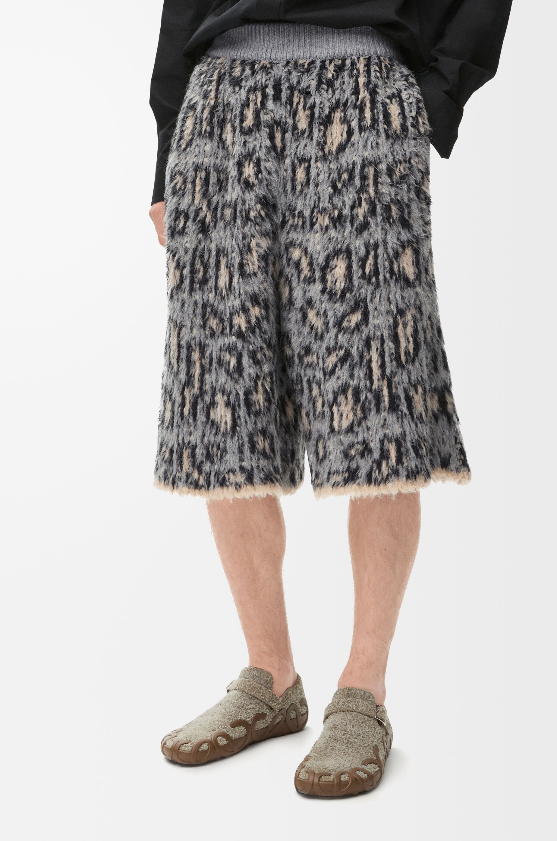 Wool cropped wide-leg pants in grey - Loewe | Mytheresa