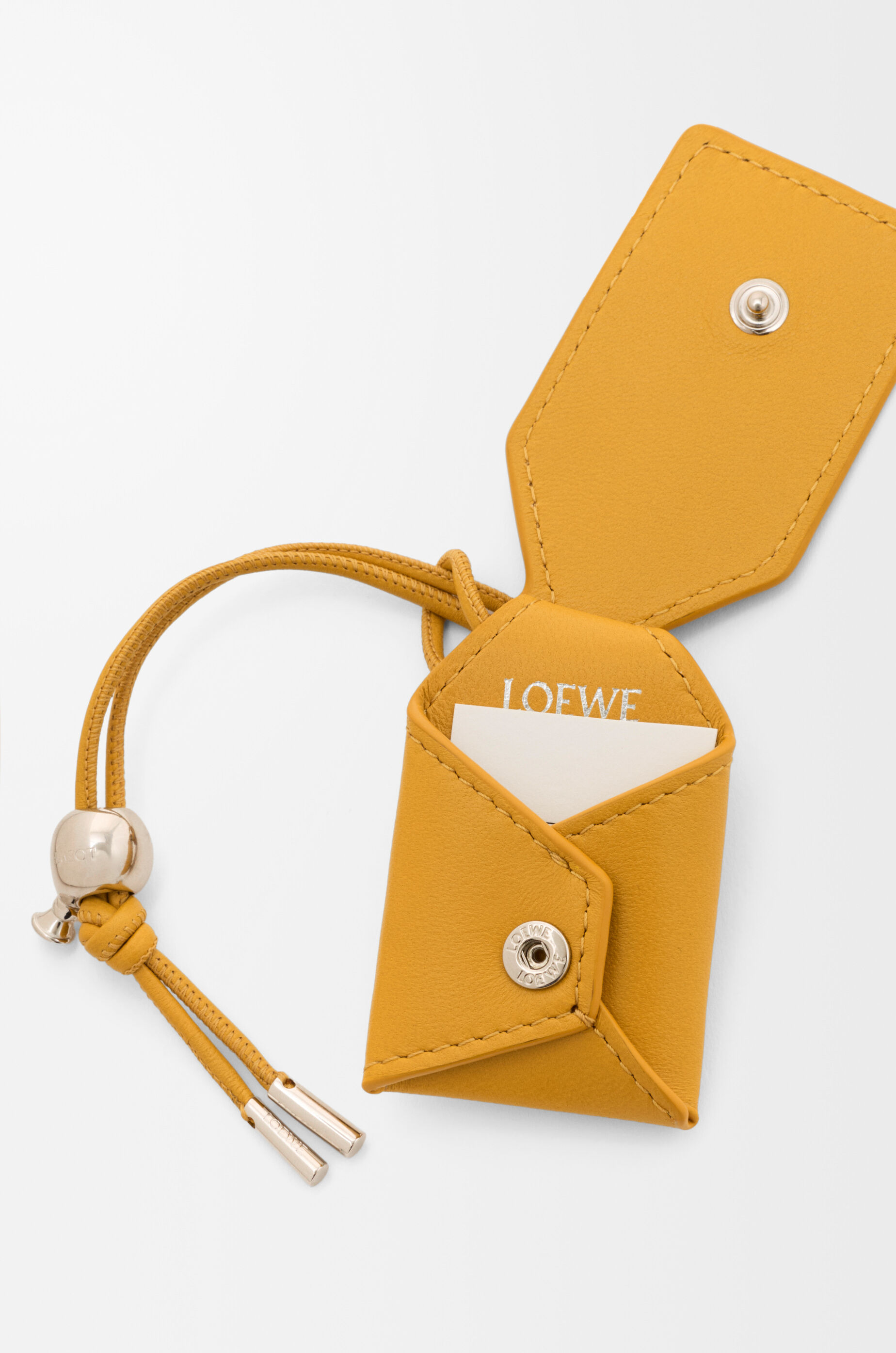 LOEWE シープスキン タッセル ケース Mini Featherlight Puzzle bag in nappa lambskin Yellow - LOEWE USA