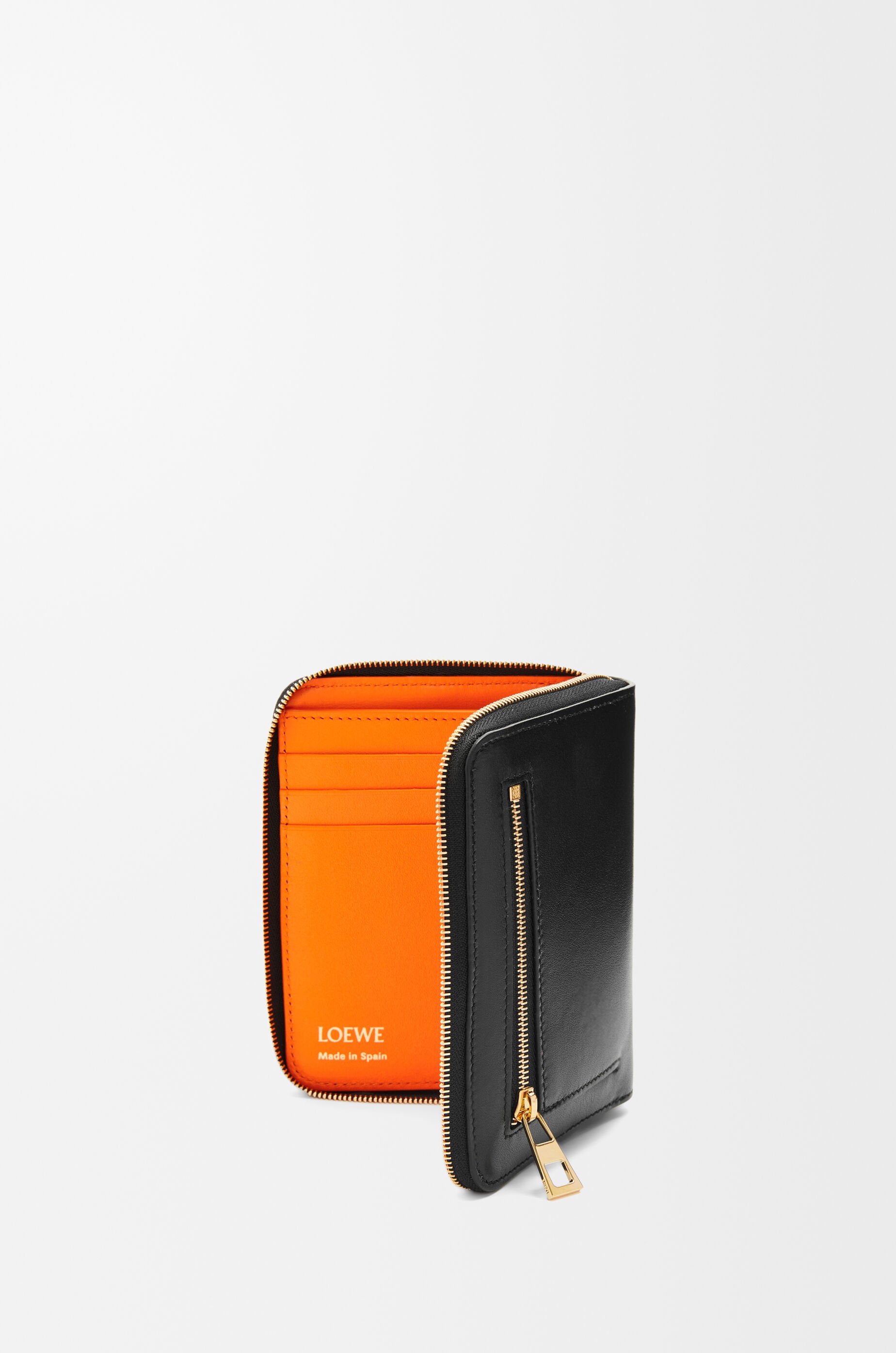 Knot compact zip around wallet in shiny nappa calfskin